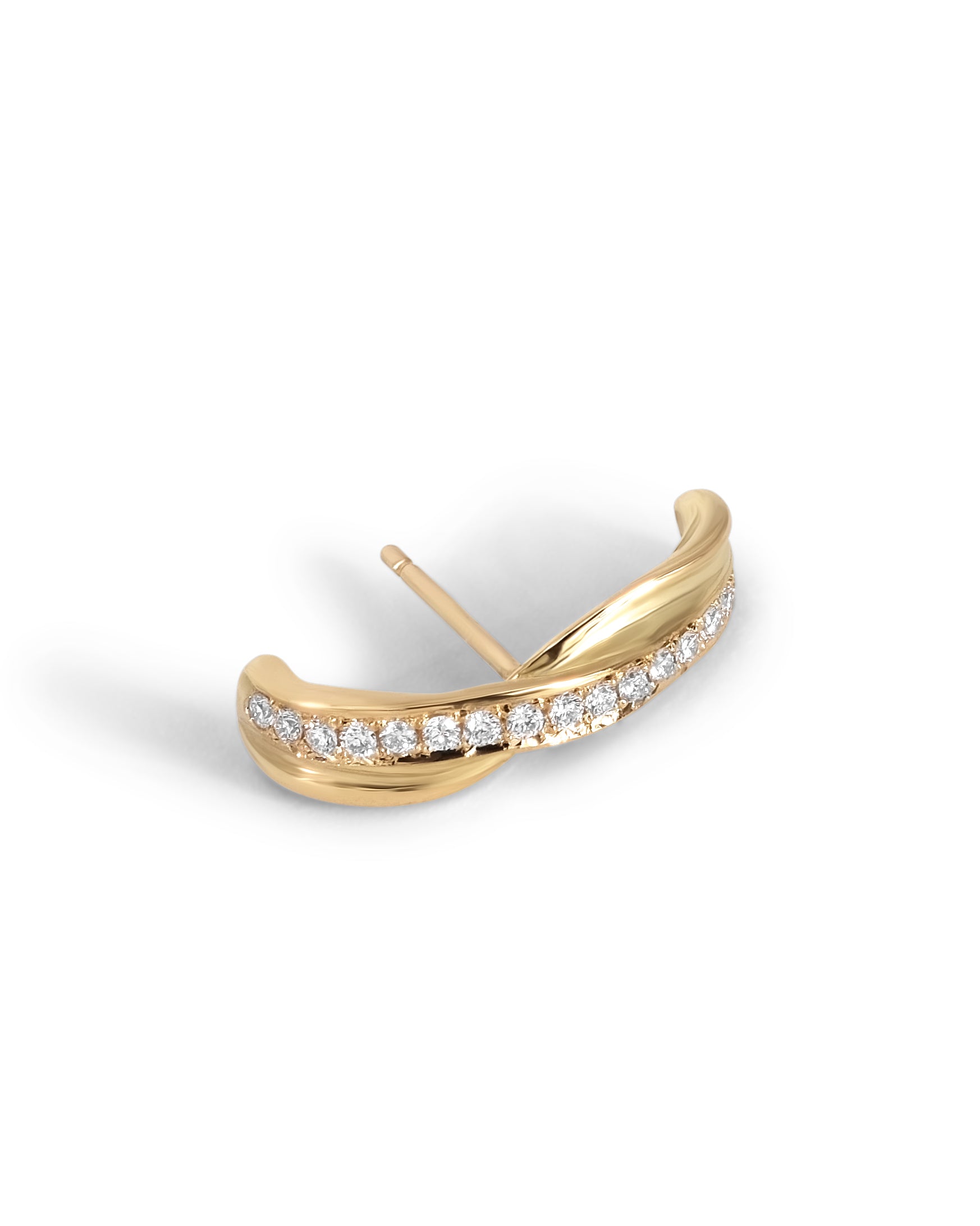 A gold crescent-shaped ear huggie with a row of pavé-set white diamonds along the front curve, shown on a clean white background.