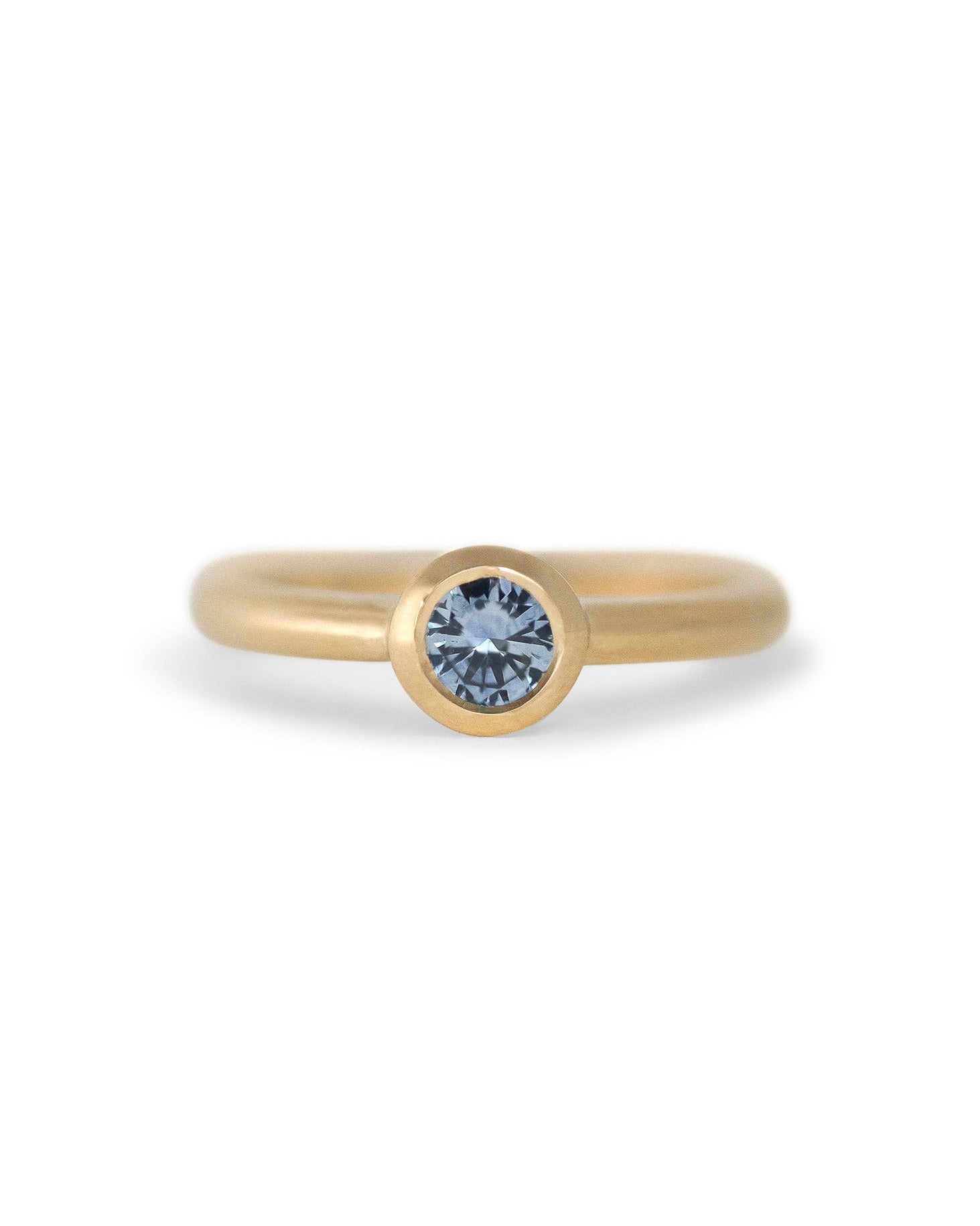 Handcrafted Montana sapphire and 18k gold engagement ring by Anne Hara. Made in Karuizawa, Japan.