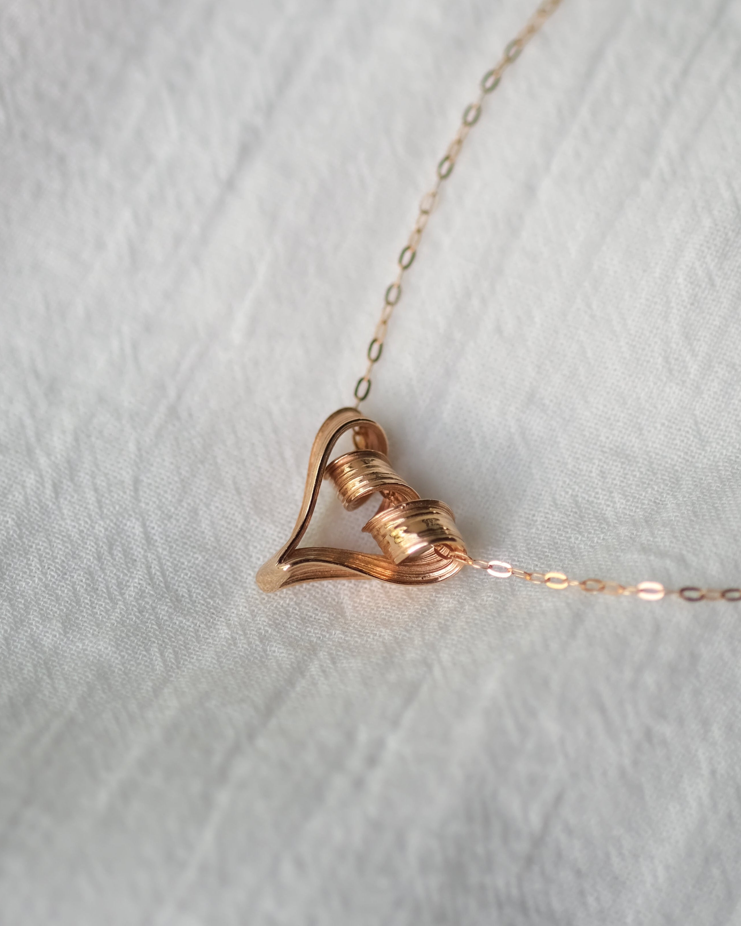 One-of-a-kind textured heart pendant in rose gold